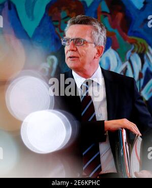 German Interior Minister Thomas de Maiziere attends the weekly cabinet meeting at the Chancellery in Berlin, Germany, May 10, 2017.    REUTERS/Fabrizio Bensch