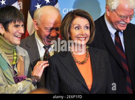 Speaker of the House Nancy Pelosi (D-CA) smiles at a news conference, following the passage in the House of Representatives of the stimulus package, on Capitol Hill in Washington February 13, 2009. Behind Pelosi are from (L-R) Representative Rosa DeLauro, Representative James Oberstar and Representative George Miller.    REUTERS/Larry Downing (UNITED STATES)