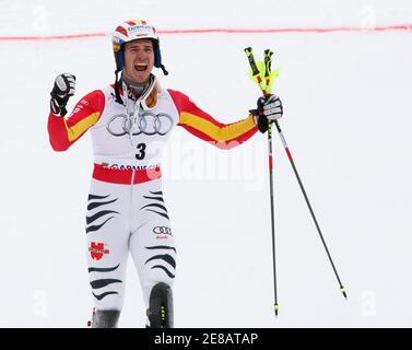 Felix Neureuther of Germany celebrates winning the men's Alpine Skiing World Cup Slalom in Garmisch-Partenkirchen March 13, 2010.  REUTERS/Wolfgang Rattay (GERMANY - Tags: SPORT SKIING)