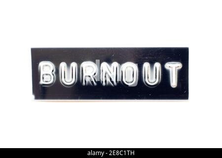 Letra en relieve en la palabra burnout en banner negro con blanco antecedentes Foto de stock