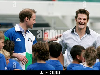 Britain's Prince William laughs with All Black's captain Richie McCaw (R) during a tour of Eden Park where the World Cup Rugby 2011 final will be held, in Auckland January 17, 2010. Prince William is in New Zealand for a three-day visit.       REUTERS/Nigel Marple (NEW ZEALAND - Tags: ROYALS POLITICS SPORT RUGBY)