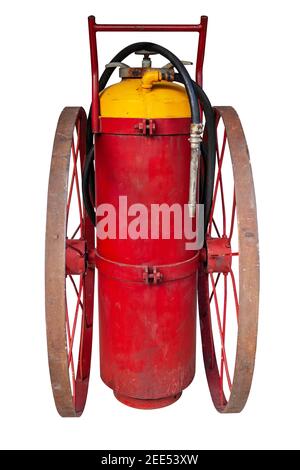 Antiguo extintor de incendios de color rojo aislado sobre fondo blanco Foto de stock