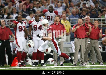 Arizona Cardinals wide receiver Jerheme Urban (85) fumbles the ball as New  Orleans Saints cornerback Randall Gay (20) and safety Roman Harper (41)  defend an NFL football divisional playoff game in New