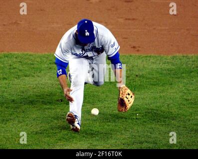 Los Angeles Dodgers shortstop Rafael Furcal, left, and center fielder  Andruw Jones collide as they chas a ball hit for a single by Atlanta  Braves' Brian McCann in the fifth inning of