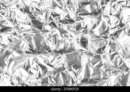 Textura de cocina de aluminio arrugado de papel de aluminio. Resumen de  plata en blanco para el diseño Fotografía de stock - Alamy