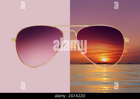 gafas de sol aviator aisladas sobre fondo rosa y de verano con el mar y el cielo rojo, concepto de lentes de protección polarizadas Foto de stock