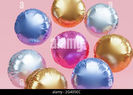 Brillantes globos de colores, fondo rosa para fiestas, cumpleaños, celebraciones o vacaciones, 3D render realista