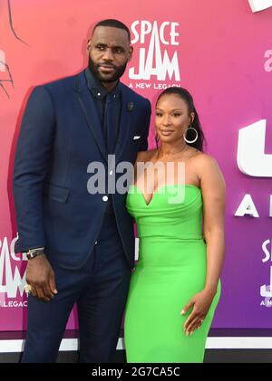 LeBron James and wife Savannah Brinson attend the world premiere of ...