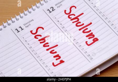 Schulung como una entrada de calendario en un calendario de escritorio, Alemania Foto de stock