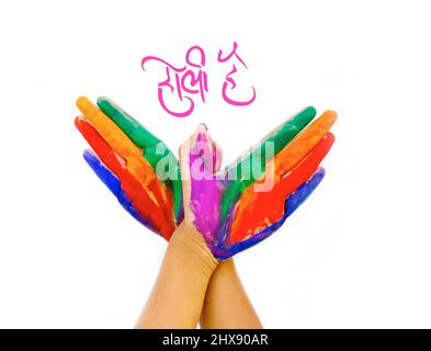 Holi Saludo en Hindi - Manos pintadas Foto de stock