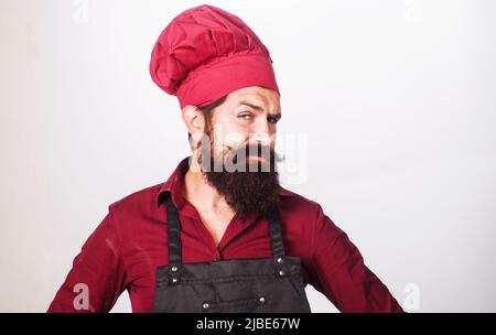 Gorro de cocinero. Chef hombre con barba de confianza en uniforme blanco.  Retrato de un cocinero serio. Chef barbudo, cocineros o panadero. Hombres  barbudos chefs aislados Fotografía de stock - Alamy