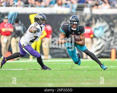 Baltimore Ravens cornerback Marcus Peters (24) reacts to the snap