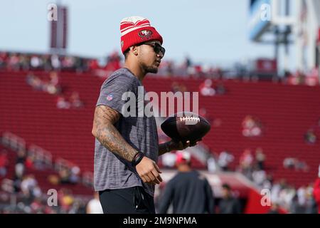 Injured San Francisco 49ers quarterback Trey Lance, facing hugs Miami  Dolphins quarterback Tua Tagovailoa (1) after an NFL football game in Santa  Clara, Calif., Sunday, Dec. 4, 2022. (AP Photo/Jed Jacobsohn Stock