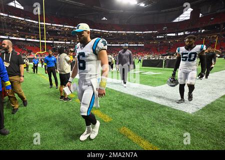 Carolina Panthers linebacker Chandler Wooten (50) battles with Denver  Broncos linebacker Justin Strnad (40) on special teams during an NFL  football game, Sunday, Nov. 27, 2022, in Charlotte, N.C. (AP Photo/Brian  Westerholt