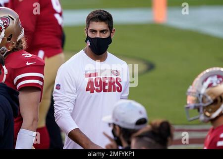 Injured San Francisco 49ers quarterback Trey Lance, facing hugs Miami  Dolphins quarterback Tua Tagovailoa (1) after an NFL football game in Santa  Clara, Calif., Sunday, Dec. 4, 2022. (AP Photo/Jed Jacobsohn Stock