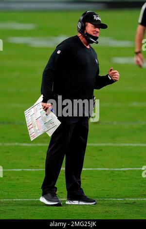 Las Vegas Raiders head coach Josh McDaniels watches players warm up before  an NFL football game against the Denver Broncos in Denver, Sunday, Nov. 20,  2022. (AP Photo/David Zalubowski Stock Photo - Alamy