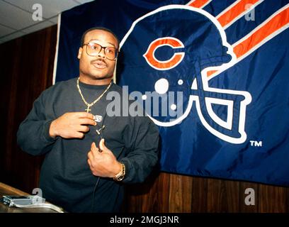 Chicago Bears linebacker Mike Singletary looms in on Minnesota Vikings  quarterback Steve Dils as he fumbles in the fourth quarter of game causing  an 11-yard loss, Dec. 11, 1983 in Minneapolis. Dils