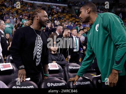 Boston Red Sox's Hanley Ramirez, right, pulls the hair of Rafael