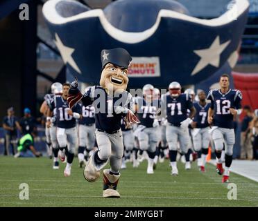 New England Patriots mascot Pat Patriot steps out of kiddie pool wearing  rubber waders and a fishing vest during the primiere of a new Bass Pro  Shops store being constructed on the