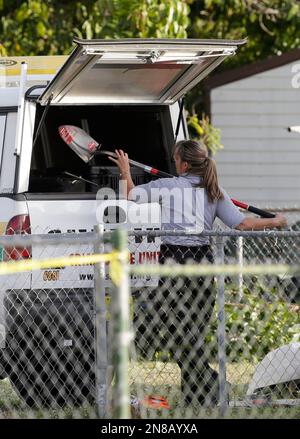 Broward Sheriff's Office Crime Scene Det. Dan Krystyn identifies a cell ...