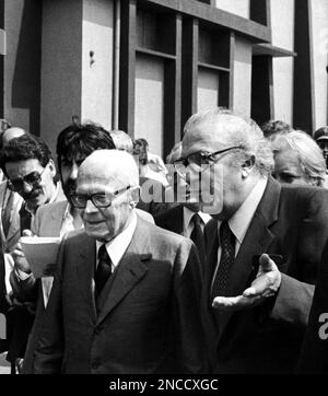 Italian President Sandro Pertini, left, and Italian movie director Federico Fellini pictured at Cinecitta studios, the famous cinema city on Rome’s outskirts, Italy, on Friday, June 4, 1982. The 85-year-old Italian President gave recognition to the Italian film industry in a visit to the studio for the Golden Globe Awards from the Foreign Press for the best movies of the season. (AP Photo/Gianni Foggia)