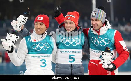 (R-L) Japan's Akito Watabe, silver, Germany's Eric FRENZEL, gold and