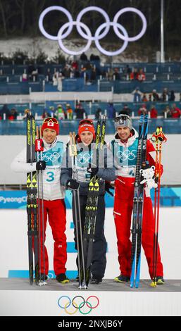 (R-L) Japan's Akito Watabe, silver, Germany's Eric FRENZEL, gold and