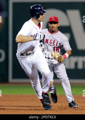 Boston Red Sox' John Olerud watches his three-run home run with Baltimore  Orioles catcher Geronimo Gil during the fifth inning of Boston's 5-1 win at  Fenway Park in Boston Sunday, Sept. 4