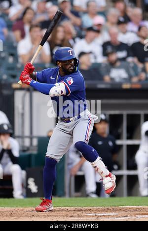 CHICAGO, IL - JUNE 21: Texas Rangers center fielder Leody Taveras (3) bats  during an MLB game against the Chicago White Sox on June 21, 2023 at  Guaranteed Rate Field in Chicago