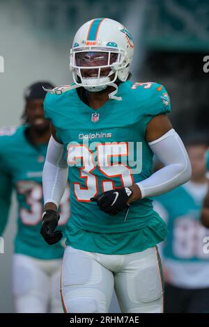 Miami Dolphins safety Myles Dorn (35) runs onto the field with the team  before the start an NFL pre-season football game against the Atlanta  Falcons, Friday, Aug. 11, 2023, in Miami Gardens