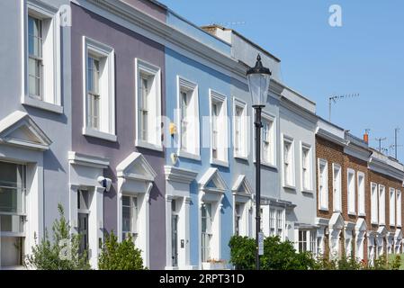 Colourful terraced houses in Kensington Place, Notting Hill, West London UK