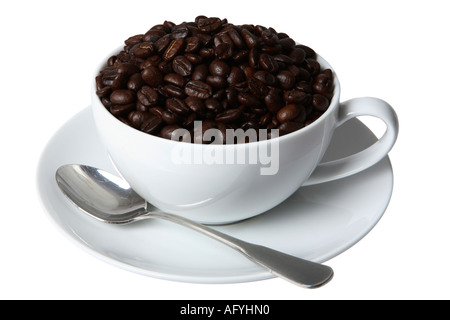 Cáliz con granos de café. Foto de stock