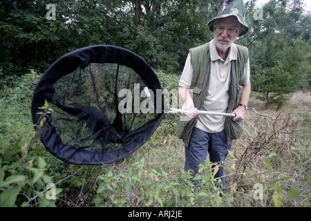 Hombre con Mariposa neto Midlands UK Foto de stock