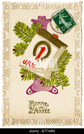 Circa 1908 franceses "Feliz Año Nuevo" fancy postal representando el 1 de enero calendario, rama de abeto y horseshoe - Francia. Foto de stock