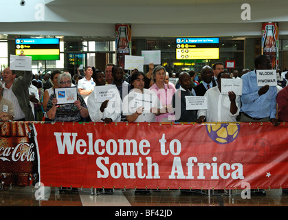 Bienvenido a Sudáfrica - banner en el hall de llegadas de la O.R. El Aeropuerto Internacional de Tambo (ORTIA), Johannesburgo, Sudáfrica Foto de stock