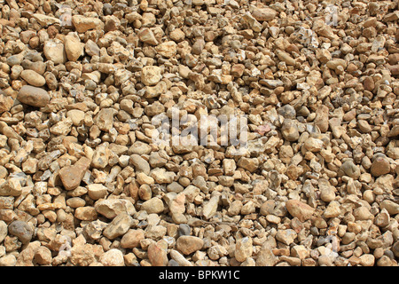 Las piedras de un hoyo de arena en la vista de página completa Foto de stock