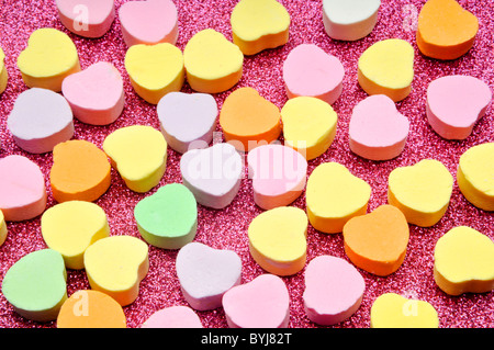 Día de San Valentín candy en superficie sparke rosa