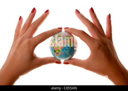 Womans manos sosteniendo Small World - Globo - Planeta - Business Foto de stock