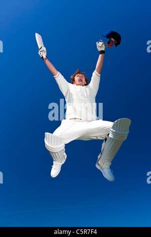 Un cricketer celebra. Foto de stock