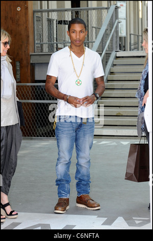 Pharrell Williams attends the Louis Vuitton Fall/Winter 2023-2024  ready-to-wear collection presented Monday, March 6, 2023 in Paris. (AP  Photo/Christophe Ena Stock Photo - Alamy