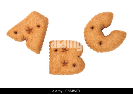 Alfabeto ABC galletas de chocolate sobre fondo blanco. Foto de stock