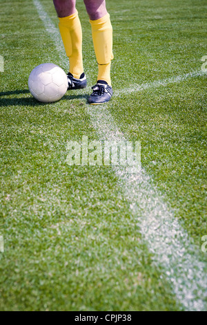 Fútbol o jugador de fútbol en el campo