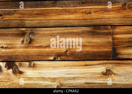 Soportó la tabla de madera de una vieja cabaña, gran fondo y textura, todos los detalles visibles. Foto de stock