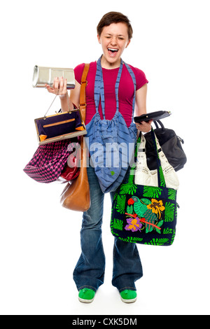 Desnatar Parpadeo Cierto Una hembra joven posa con un montón de carteras y bolsos de señoras y de la  mujer Fotografía de stock - Alamy