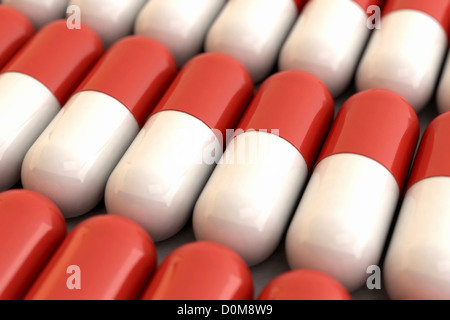 Vista cercana de numerosas cápsulas de medicamentos. Foto de stock