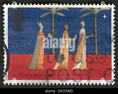 Reino Unido - alrededor de 1996: un sello impreso en el Reino Unido muestra la imagen de los Reyes Magos, también conocidos como los Sabios (3), (3) Los Reyes, o reyes del oriente, circa 1996. Foto de stock