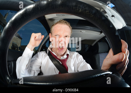 Empresario coche mostrando Road Rage Foto de stock
