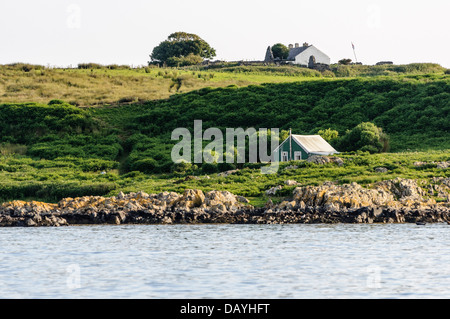 Casas en la isla Copeland, Irlanda del Norte, que están ocupados durante el verano. Foto de stock