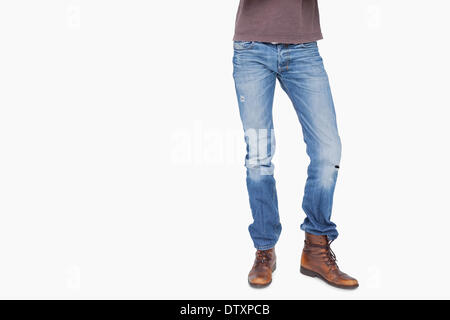 Hombre con jeans y botas Fotografía de stock - Alamy