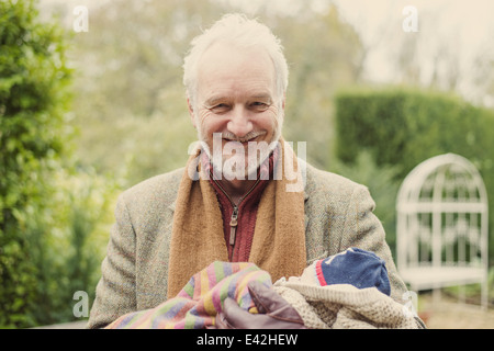 Abuelo acunando nieto, Retrato